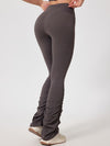 ZASUWA Female Solid Color Flare Folds High-rise Leggings