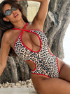 ZASUWA Female Leopard Print Cutout Cross One Piece