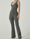 ZASUWA Female V Collar Backless Pocket Flare Jumpsuit