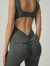 ZASUWA Female V Collar Backless Pocket Flare Jumpsuit
