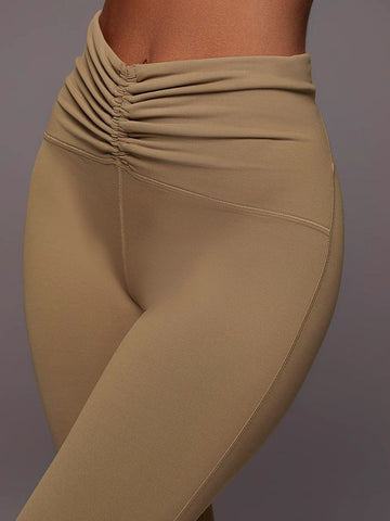 ZASUWA Female Solid Color Unique Folds V Shape Waist Leggings