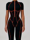 ZASUWA Female Sexy Backless Zipper Contrast Color Stripes Stitch Performance Jumpsuit